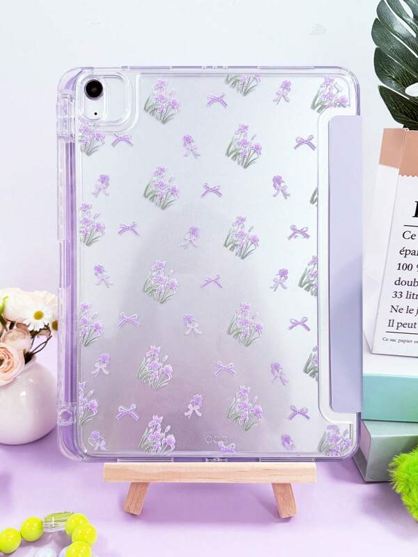 Étui pour tablette en acrylique transparent à trois volets, motif fleurs violettes et nœuds, avec emplacement pour crayon, coque arrière transparente, anti-pliage, anti-rayures et anti-chute, fonction veille/réveil magnétique, compatible avec iPad Mini 6/7, Air 1 pièce/2/4/5, 9,7/10,2/10,5/10,9/Pro 11 pouces, 10e/11e génération. Stylet non inclus. Certains modèles sont livrés avec un cadre d'objectif.