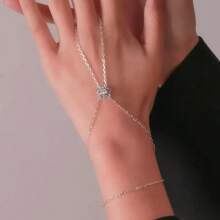 1 pieza Pulsera de dedo con conexión de color dorado y rhinestones, joyería elegante y de moda para mujer, cadena de mano para novia