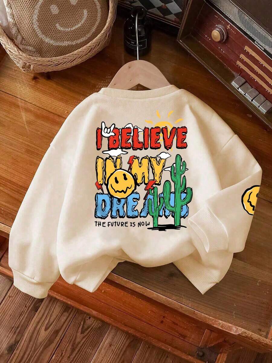 Moletom infantil de manga comprida e gola redonda, estampado com a frase "Eu acredito nos meus sonhos", confortável, estiloso e casual, perfeito para outono/inverno. Ideal para meninos e adolescentes. - Damasco - Ver 1