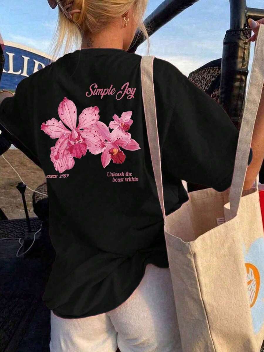 Plus Size Women's Colorful Letter & Floral Print Round Neck T-Shirt, Fashion & Versatile. White & Pink Printed Tee, Suitable For Daily Wear, Outings, Parties, School, Music Festivals, Vacations, Commuting, Etc. Can Be A Gift For Family, Boyfriend, Girlfriend, Friends, And An Ideal Summer Clothing Choice For Girls. - Black - View 1