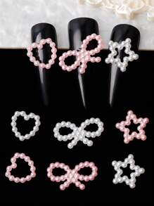Caja de 44 piezas de decoración de arte de uñas con corazones de perlas blancas y rosas, estrellas de cinco puntas de perlas y lazos de perlas. Juego de accesorios de encanto tridimensional de lazo, estrella de cinco puntas y corazón para decoración de uñas de damas en fiestas, bailes y citas. Caja de regalo de accesorios de decoración de arte hecho a mano, adecuado para decoración de uñas y accesorios de maquillaje.
