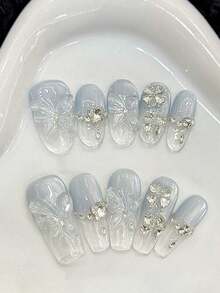 10片浅蓝色短椭圆/长棺材形美甲贴片，透明法式3D花朵蝴蝶凝胶设计，简约蝴蝶水钻假指甲，适合学校、音乐节、派对美甲用品，手工制作美甲贴片 - 淺藍色 - 查看 1