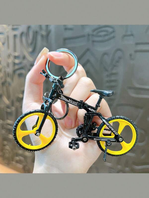 Schlüsselanhänger aus einfarbiger, faltbarer Legierung in Fahrradmodell-Form, kreative bewegliche Simulation eines Mountainbikes als Anhänger, kleines Geschenk für Fahrrad-Fans, Dekoration für Rucksack in der Schule
