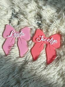 Bow Girls Backpack Name Tag, Name Charm, Backpack Tags, Girls Keychain, Bag Tag, Name Tag For Girls, Gift For Girls, Matching, School Supplies, Back To School, School Gift, For Office, For School, For Classroom, For Colleague, For Dorm Rooms, Junior High School Students, Middle School Students, Sophomore, Underclassmen, Personalized, Unique, Customized, Ideal Gifts For Him, Ideal Gifts For Her, Her, Boyfriend, Girlfriend, Family, Friends