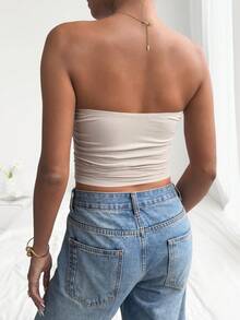 Top tubo ajustado, elegante y sexy con diseño de escote envolvente, espalda descubierta, fruncido, hebilla en forma de gota de agua y diseño hueco, unicolor de verano Mystra