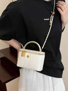 百搭休闲手提包，时尚蛇皮纹理材质，适合携带手机、口红、零钱