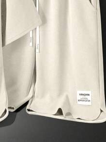 Conjunto de camiseta casual de manga corta y cuello redondo de unicolor, y pantalones cortos con cordón en la cintura con estampado de letras para adolescentes niños/niñas de verano