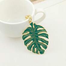 سلسلة مفاتيح ذات شكل وردة شجرة وراء سلحفاة فارغة DIY، قلادة شكل ورق شجر نرويجية خضراء زيتية طبيعية، إكسسوارات حقيبة ، ديكور من الفولاذ المقاوم للصدأ عادي، صيفي - مقاس واحد يناسب الجميع - مشاهدة 1