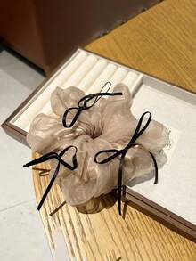 1个甜美韩式网纱蝴蝶结发圈，适合女性，可用于派对和正式场合，可作发绳、马尾辫发圈、发圈、发饰等。