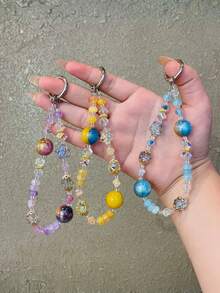 1 件全新时尚银河猫眼珠和星形水晶挂链，防丢失钥匙扣装饰，精致高端手机壳吊饰，男女通用手链