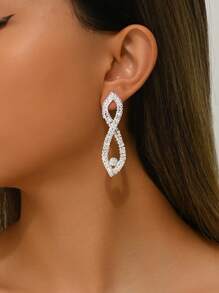 1 par de pendientes colgantes ovalados y huecos con cristales, estilo europeo y americano, para combinar con vestidos formales para mujer