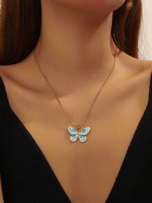 1 goldfarbene Edelstahl-Halskette mit kontrastierendem öltropfenblauem Gradienten-Schmetterling-Anhänger