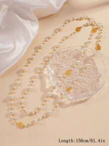 1 pièce Collier long de perles pour femmes, chaîne polyvalente multi-couches pour pull, avec un motif floral creux de Camélia, accessoire élégant de mode pour soirée