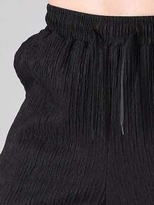 Pantalones casuales para hombre de unicolor para la playa - Diseño de cintura elástica cómodo, adecuado para uso casual y actividades al aire libre - Negro - Ver 7