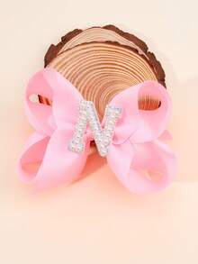 1 pieza Clips para el cabello con moños y letras del abecedario de color rosa para niñas, clips de pelo con lazo y decoración de perlas en forma de letras, accesorios de moda con pinzas de cocodrilo para regalos de fiesta y uso diario - Rosa - Ver 35