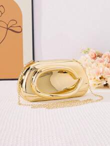 时尚金色手拿包，独特的手柄设计，适合正式活动和派对