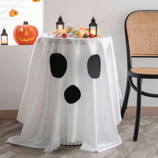 Nappe d'Halloween avec ambiance festive, toile d'araignée, citrouille, décoration de table