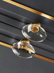 6 قطع مقابض خزانة بشكل بيضاوي شفاف من الاكريليك، مناسبة للخزائن والدواليب والأدراج، من خامة النحاس بطلاء لون الشمبانيا، بأسلوب فاخر، تأتي مع البراغي