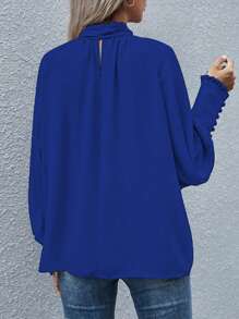 Blusa de manga larga con botón, lazo y estilo suelto de unicolor, estilo europeo y americano para mujeres