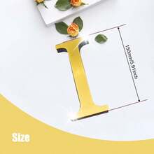 金色字母 A-Z 墙贴 - 单个字母高度 10cm/15cm/20cm，亚克力镜面材质，带 1cm 厚泡沫背衬。双层设计带来更佳的 3D 立体效果；单层设计外观更简洁。自带背胶，可粘贴于墙面或玻璃上。