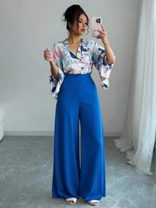 Conjunto de pantalones de pierna ancha: Top de manga larga con estampado azul y pantalones de pierna ancha
