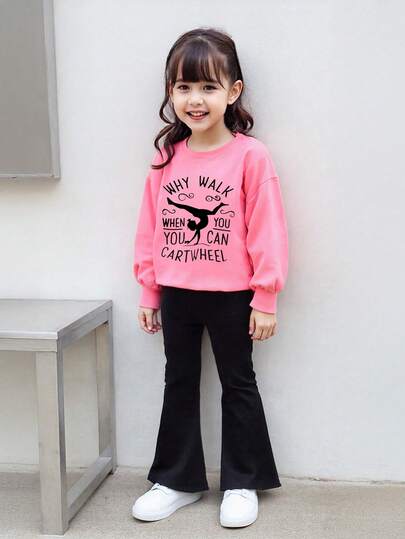 قطعتين من ملابس بنات صغيرات للخريف: بلوزة رياضية مطبوع عليها نص باللون الزهري + بنطال أسود مرن، طباعة كرتونية نشيطة