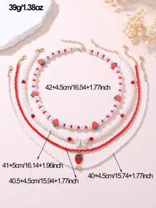 Set de 4 collares con cuentas de perlas con diseños de corazones y fresas para niñas