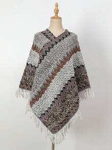 1 件纯色镂空蝙蝠翼流苏针织斗篷