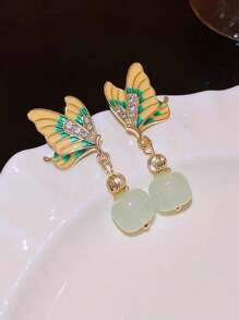 1 par de nuevos pendientes elegantes de mariposa verde retro estilo chino, un regalo de lujo ligero y elegante para mujeres