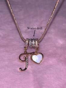 1件简约立方氧化锆心形宝石字母金色DIY项链，可定制简约字母名字项链，不锈钢吊坠项链，时尚、复古、休闲、个性化，独特礼物，适合送给女友、妈妈、家人、朋友、女儿，周年纪念日、情人节、母亲节、生日、毕业典礼、日常佩戴、婚礼、休闲场合，适合周年纪念日、生日、毕业典礼、舞会、派对等场合，定制时尚珠宝，精致浪漫，银色时尚
