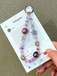 1 件全新时尚银河猫眼珠和星形水晶挂链，防丢失钥匙扣装饰，精致高端手机壳吊饰，男女通用手链