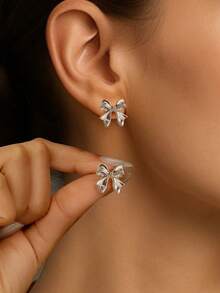 1 par de pendientes de lazo elegantes y geométricos para mujer, accesorios de joyería elegantes para ropa diaria. Pendientes de lazo dorados de Navidad, regalos navideños y de Año Nuevo. Pendientes de verano con diseño de lazo, accesorios de joyería para fiestas en la playa. - pendientes de lazo - Ver 3