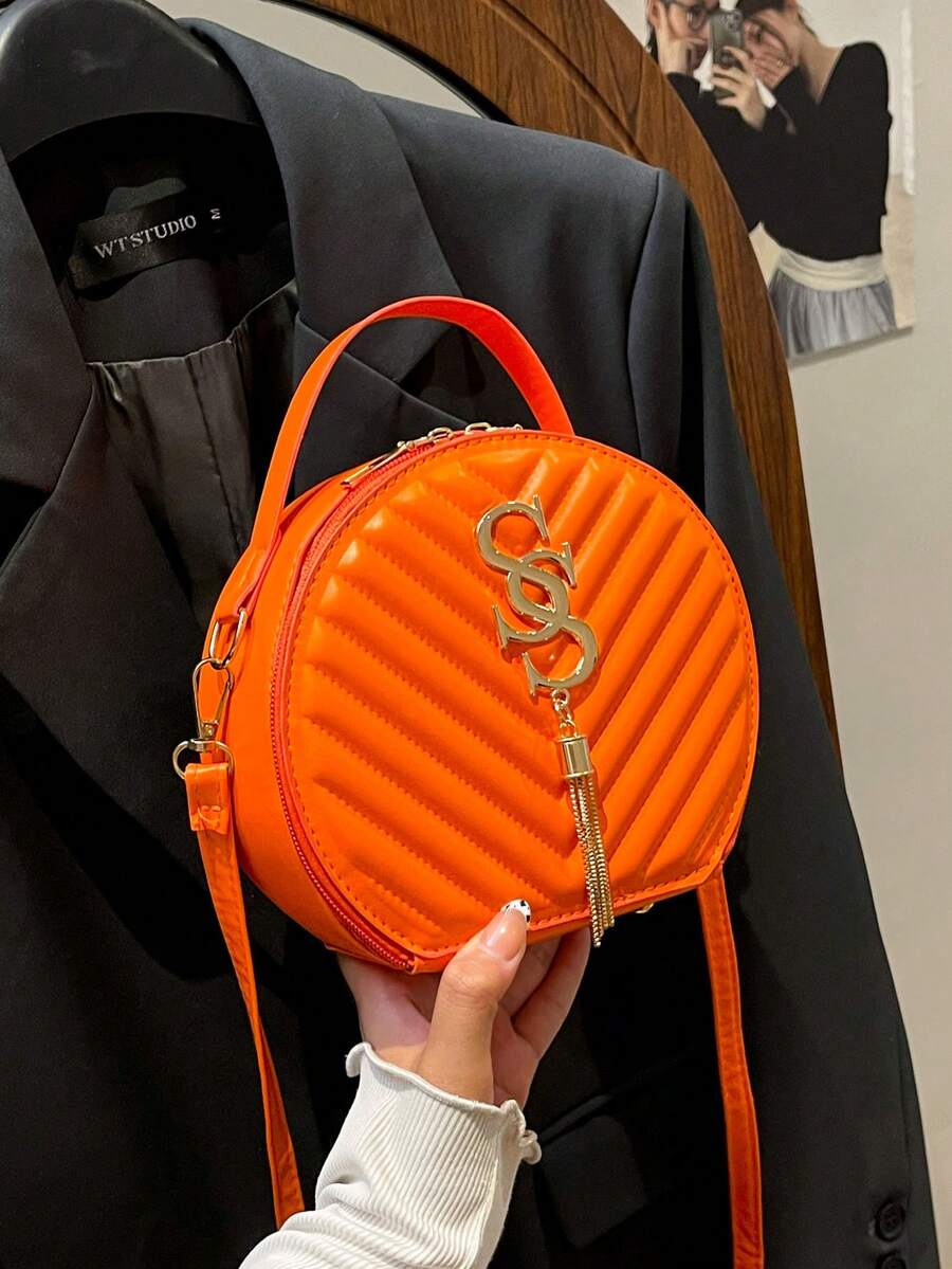 圆形设计女士手提包复古PU单肩包时尚手拿包斜挎包女士旅行手提包