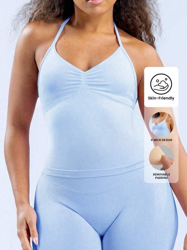 Yefecy Nueva Camiseta deportiva de impacto para yoga de mujer, top de yoga para gimnasio, ropa de entrenamiento con espalda descubierta, fruncido, con sujetador incorporado con copas