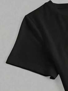 CAMISETA DE CUELLO REDONDO MANGA CORTA IDEAL PARA TI  CON ESTAMPADO DE MOÑO LENTEJUELA NEGRO .