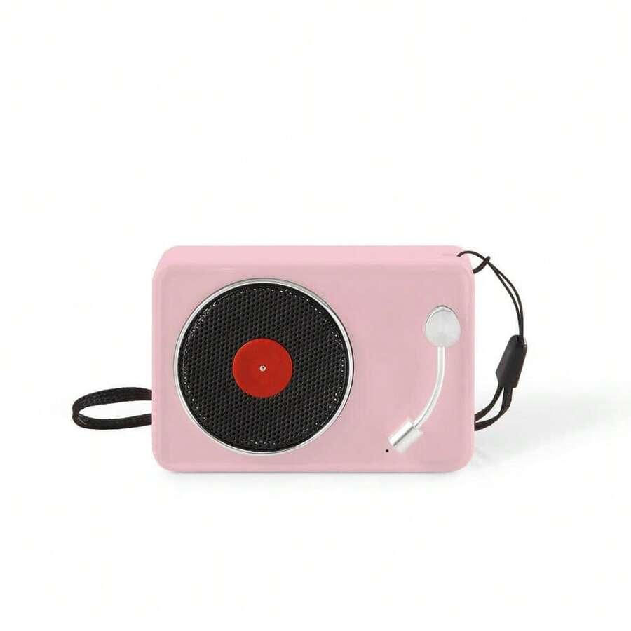 Compact Retro-Style Player Combines Vinyl Record Playback With Bluetoo Th Speaker Functionality. Portable Design, Built-In Speakers, And Headphone Jack-Ideal For Vintage Vibes On The Go, Blending Nostalgic Audio With Modern Wireless Connectivity.