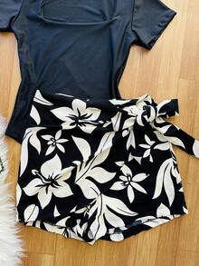 KISTYLE Women's Set Of Suplex Bodysuit + Skirt With Printed Shorts With Lining - Black and Transparent - View 2