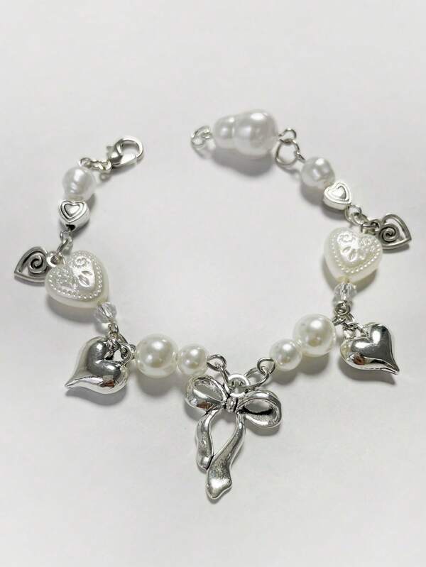 1pc Fashion Minimalist Casual Bowknot & Heart Hollow Rotating Acrylic Beaded Bracelet, Suitable For Women Everyday Or Party Wear