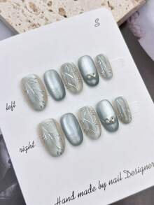 10 件短椭圆形假指甲，法式优雅银色 - 蓝色波纹猫眼设计，白色 3D 手工雕刻花卉装饰和金色中心，100% 手工制作按压式亚克力指甲可重复使用指甲用品，适合女性日常或派对佩戴 - 彩色 - 查看 2