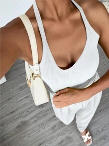 Top sin espalda de punto con cuello halter en color blanco para looks chic de verano