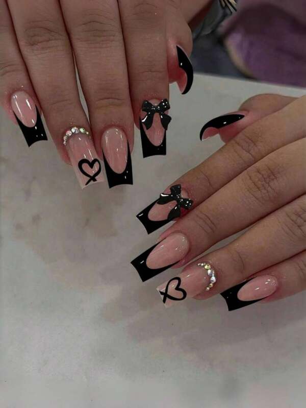 24 Uñas acrílicas postizas con diseño en forma de corazón en color negro, francés rosa y lazo, de estilo largo tipo ataúd que se ajustan perfectamente