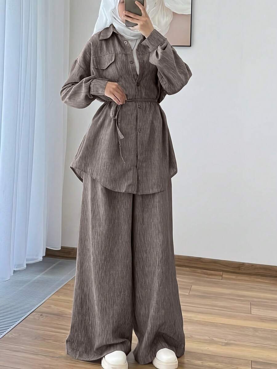 Bộ đồ công sở nữ 2 món, chất liệu kép, gồm áo sơ mi và quần ống rộng, thiết kế áo kiểu tối giản thanh lịch kèm thắt lưng, quần cạp chun có túi. - Rỉ Nâu - Xem 1