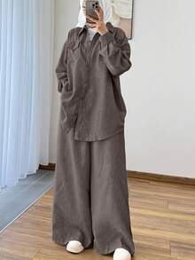 Bộ đồ công sở nữ 2 món, chất liệu kép, gồm áo sơ mi và quần ống rộng, thiết kế áo kiểu tối giản thanh lịch kèm thắt lưng, quần cạp chun có túi. - Rỉ Nâu - Xem 7