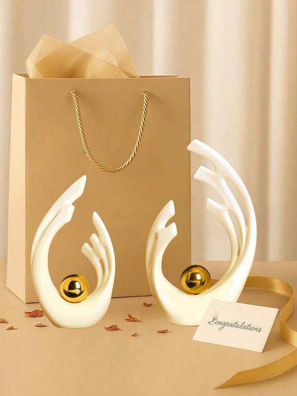 2 Pieces Of White With Gold Home Decoration, The Mid-Century Modern Decorative Table Is Decorated With White, And The Abstract Art Ceramic Statues And Sculptures Decorate The Table As The Center.