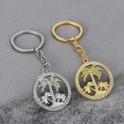 Elegante llavero de pareja con árbol de coco hueco de rhinestone, modelo creativo de planta tropical, decoración versátil para bolso, teléfono, uso diario, bonito regalo para familia y amigos en Navidad