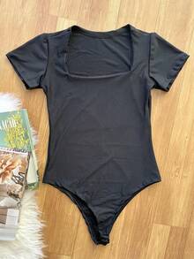 KISTYLE Women's Set Of Suplex Bodysuit + Skirt With Printed Shorts With Lining - Black and Transparent - View 5