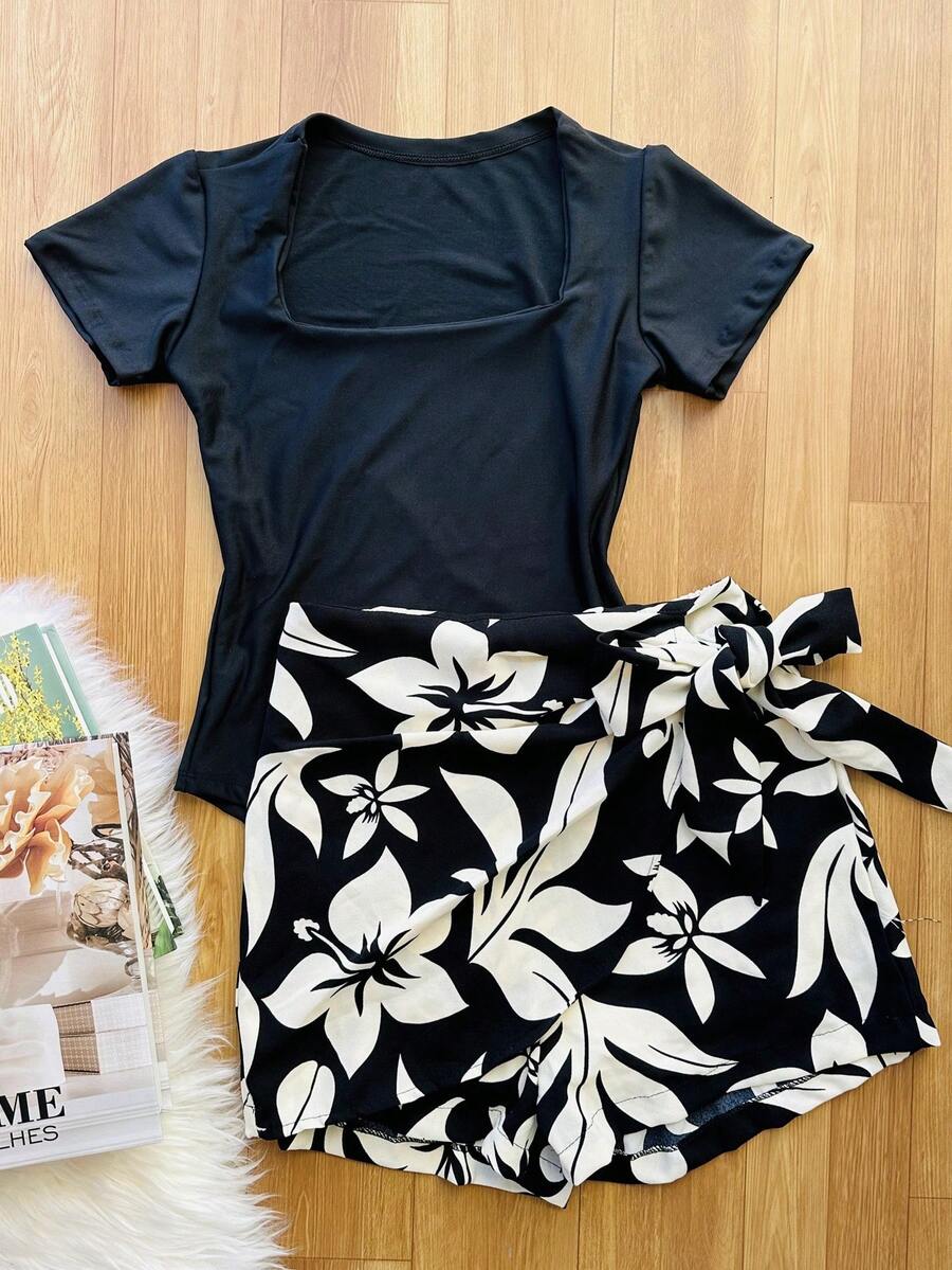 KISTYLE Women's Set Of Suplex Bodysuit + Skirt With Printed Shorts With Lining - Black and Transparent - View 1