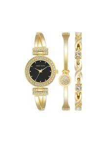 Anne Klein Reloj de pulsera y brazalete con detalles de cristal en tono dorado para mujer con esfera negra brillante. Elegante reloj de pulsera de cuarzo para mujer con brazalete ajustable.