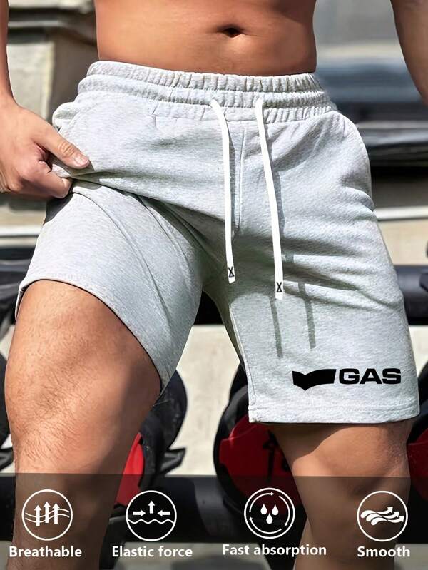 Short pour hommes - Short de style jogging gris chiné clair avec imprimé graphique lettres GAS - Look SWAG streetwear et tenue décontractée de sport - Fabriqué en tissu stretch confortable - Tenues d'été parfaites pour les hommes pour la salle de sport, l'entraînement, les voyages, les vacances ou le port quotidien - Superbe cadeau pour le petit ami, le mari, le père ou le fils