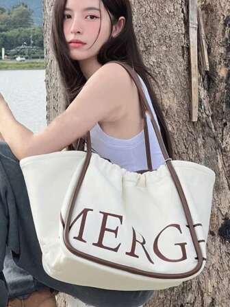 新款时尚休闲大容量字母图案装饰设计购物袋单肩手提包女士休闲钱包适合通勤上班和外出逛街聚会。